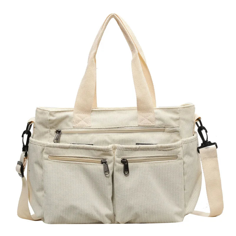 Sac bandoulière femme, velours côtelé, sac à main cabas. Look élégant, pratique pour la vie urbaine.
