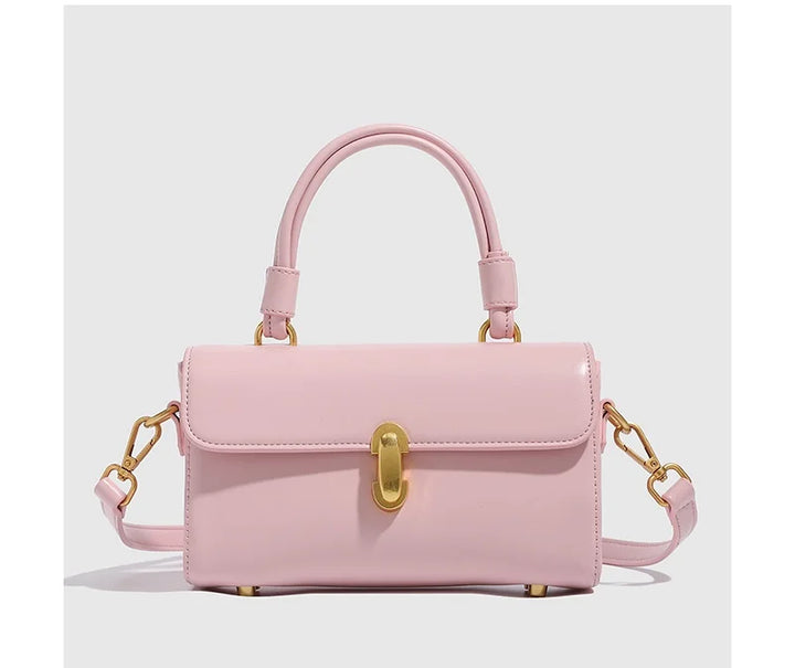 Sac bandoulière rose pâle en similicuir, idéal pour femme élégante, style minimaliste