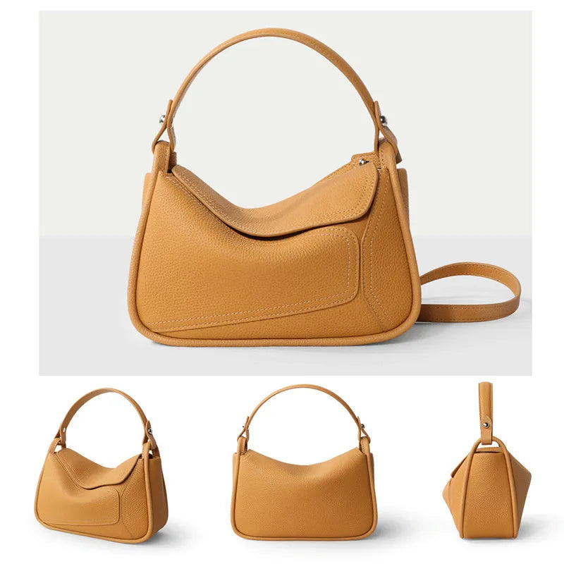 Gros plan sur la texture du cuir véritable d'un sac bandoulière femme, détail luxe.