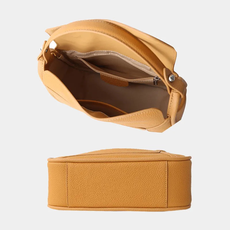 Sac bandoulière femme en cuir noir, élégant et pratique, un classique de la maroquinerie.