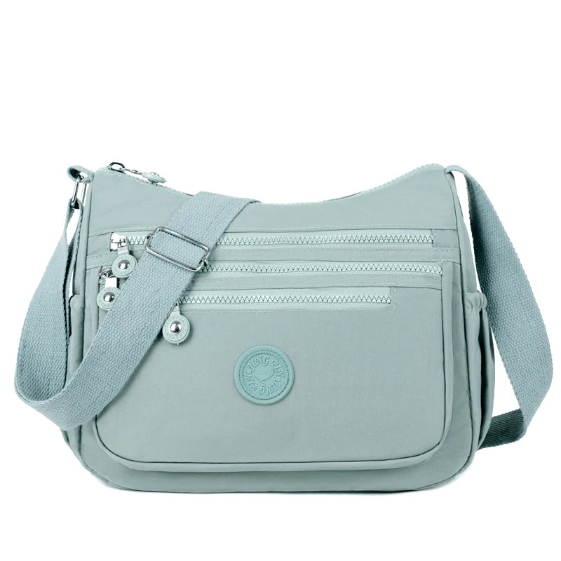 Sac bandoulière femme avec rangement intérieur optimisé, idéal pour garder vos affaires ordonnées.
