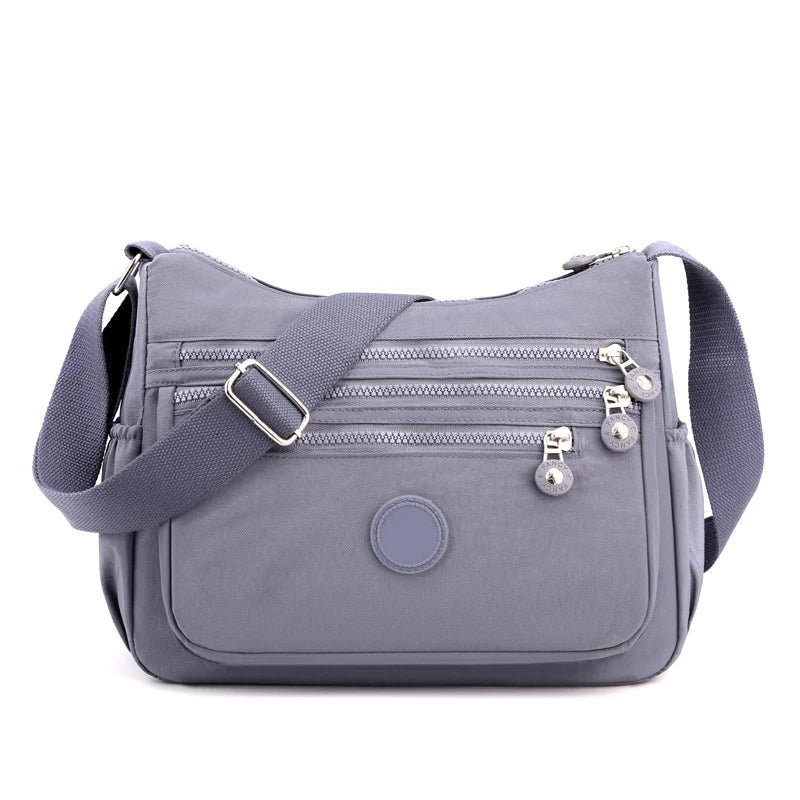 Sac bandoulière femme confortable et très organisé, simplifiant votre quotidien avec style.