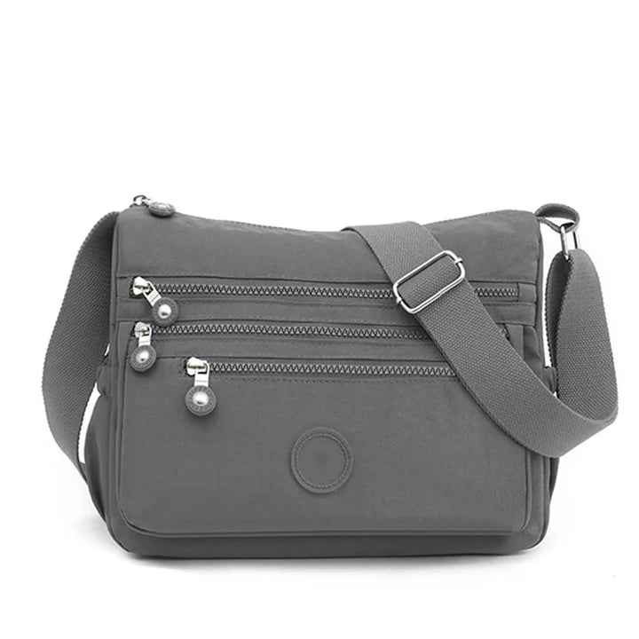 Sac bandoulière femme élégant et pratique, idéal pour le voyage et l'usage quotidien.