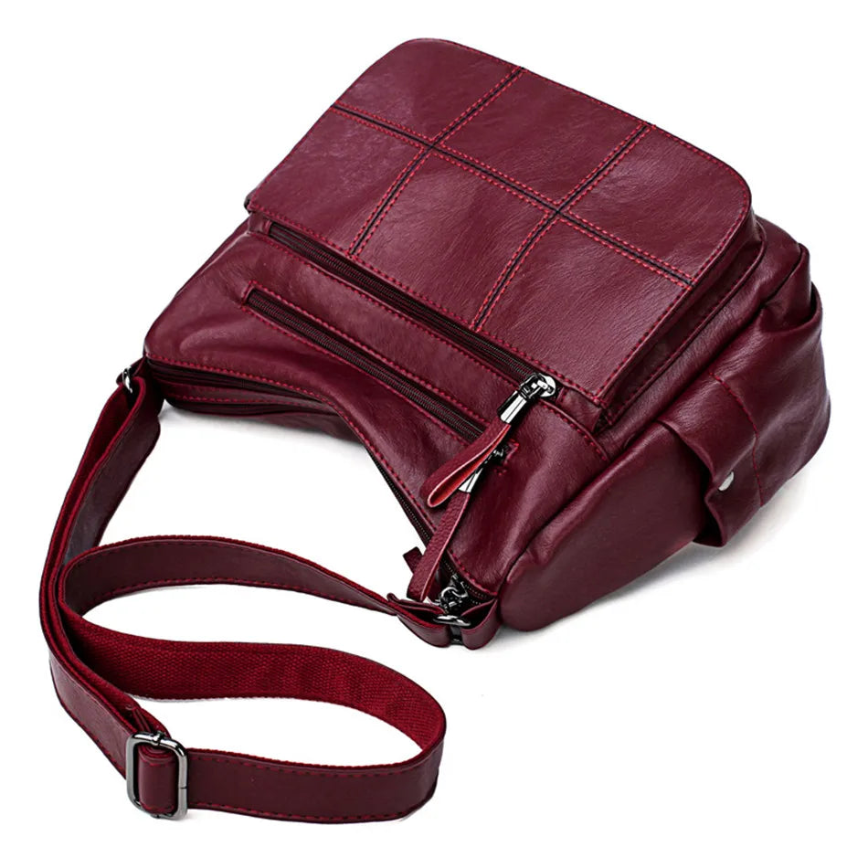 Sac à bandoulière femme Nexis rouge éclatant, parfait pour ajouter une touche de couleur à votre tenue.