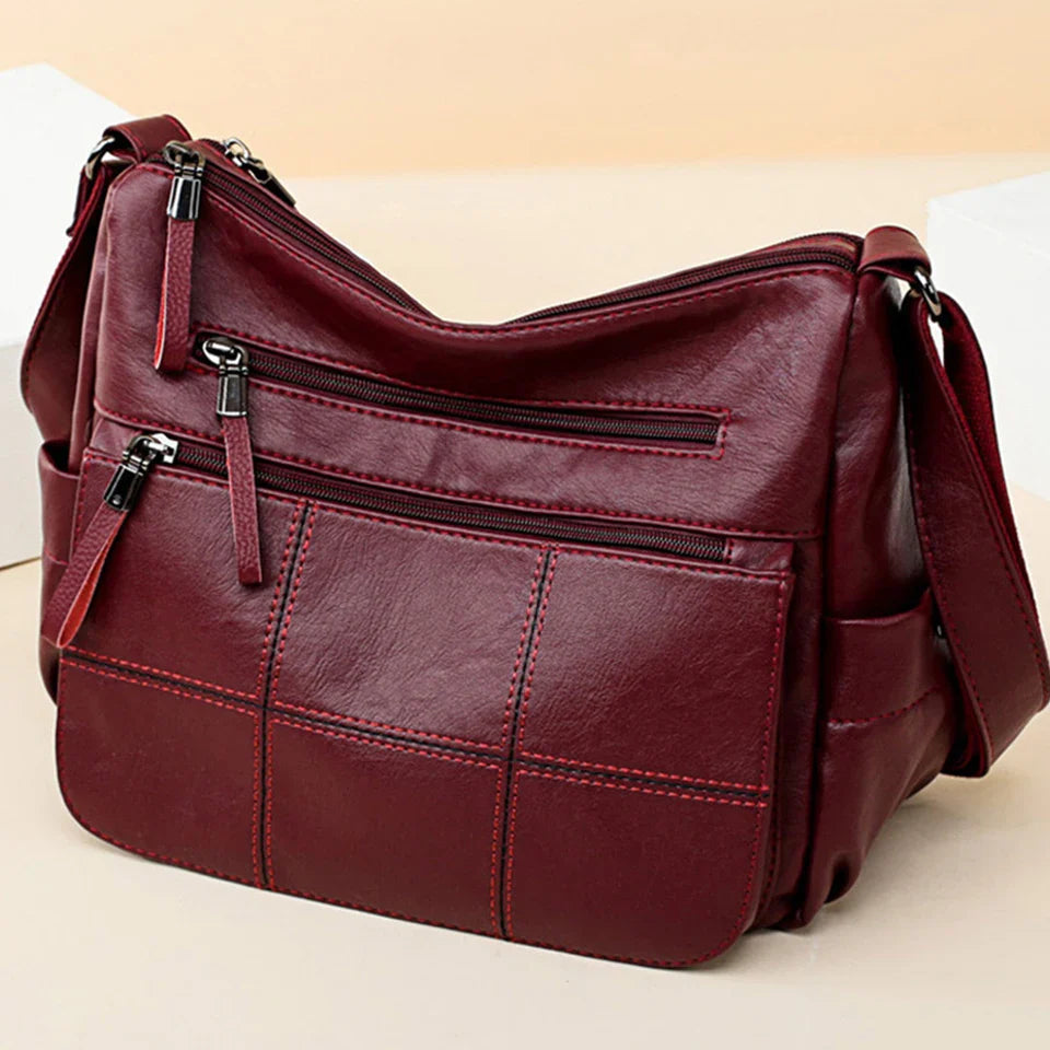 Sac à main femme Nexis bleu marine, bandoulière confortable, un ajout élégant à toute garde-robe.