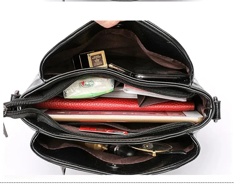 Sac bandoulière femme noir élégant avec bandoulière réglable, parfait pour un style chic et organisé en ville.
