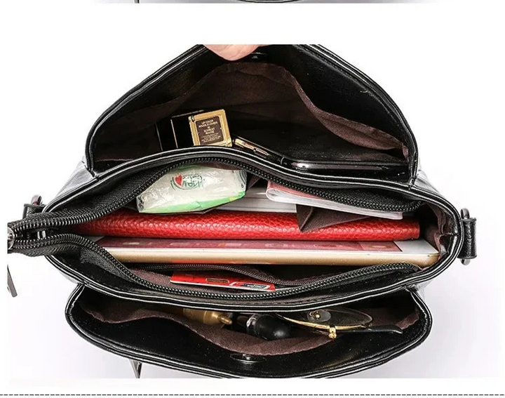 Sac bandoulière femme noir élégant avec bandoulière réglable, parfait pour un style chic et organisé en ville.