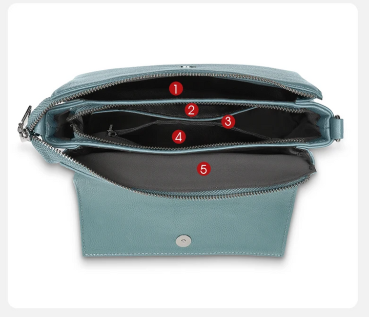 Sac bandoulière femme en cuir vegan, motif croco noir, polyvalent et chic pour diverses occasions.