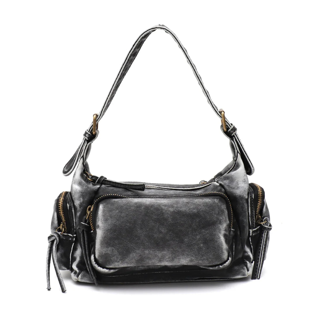 Sac femme vintage, bandoulière réglable. Similicuir effet délavé. Confort et style.