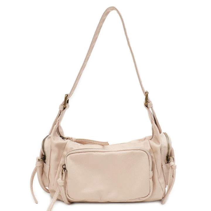 Sac bandoulière femme rétro, aspect délavé. Design élégant et fonctionnel.