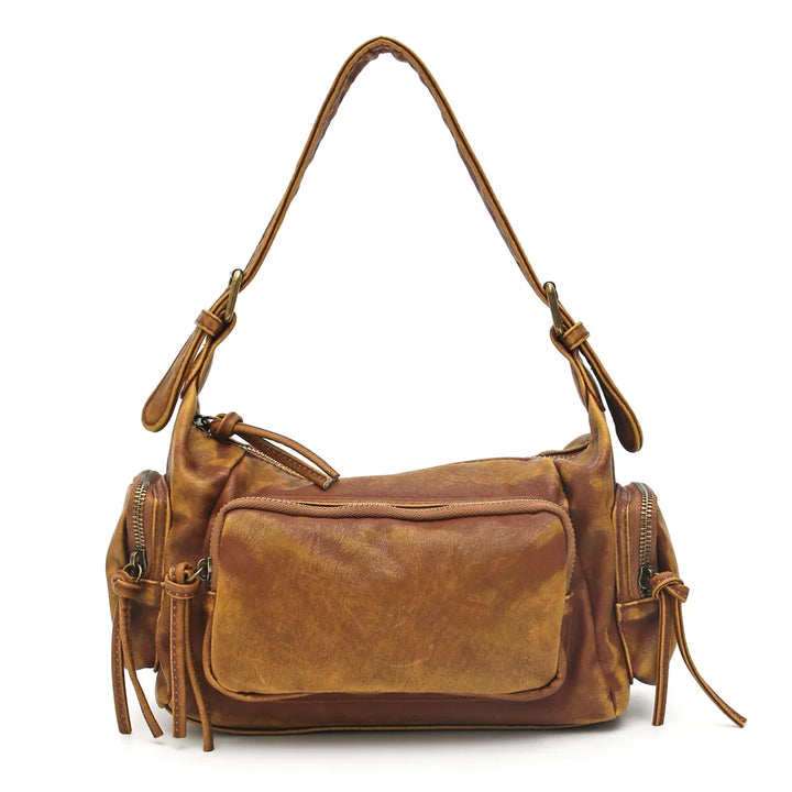 Sac bandoulière femme vintage, couleur délavée unique. Un accessoire de mode essentiel.