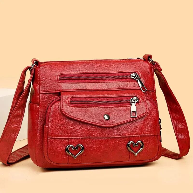 Sac bandoulière femme "Love" vintage, un accessoire mode en cuir qui affirme votre personnalité.