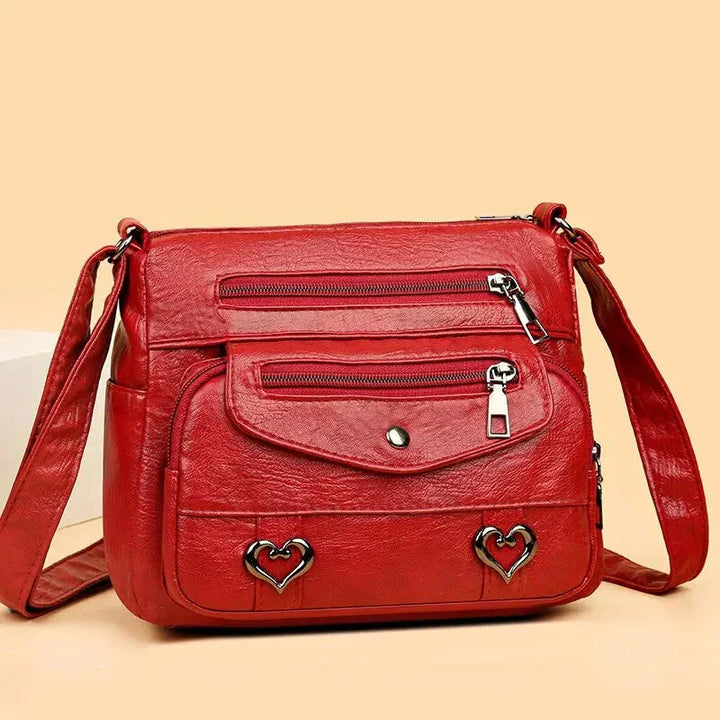 Sac femme en cuir PU vintage, motif 'Love' brodé, bandoulière réglable pour confort.
