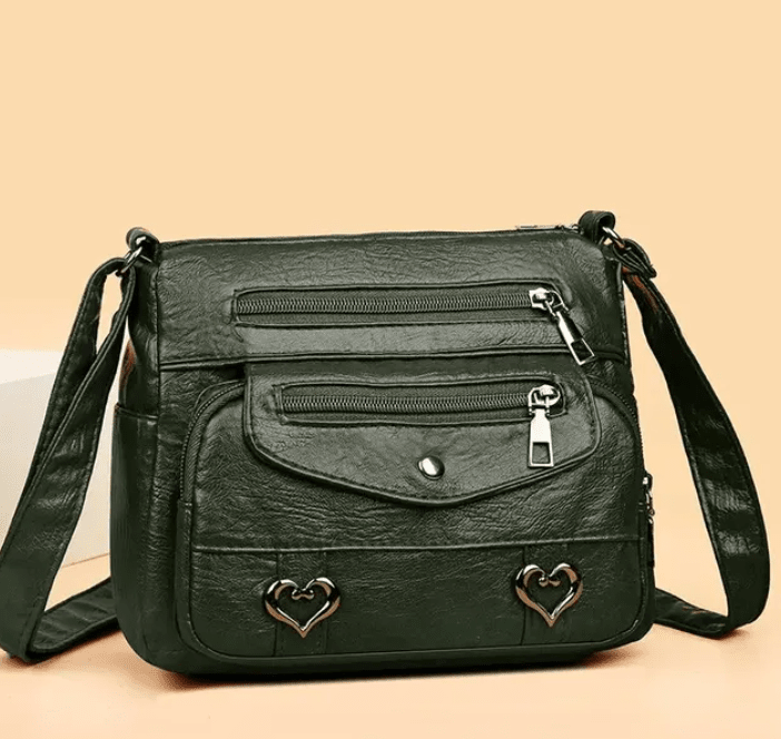 Sac bandoulière femme idéal pour le quotidien, accessoire mode vintage avec message 'Love'.