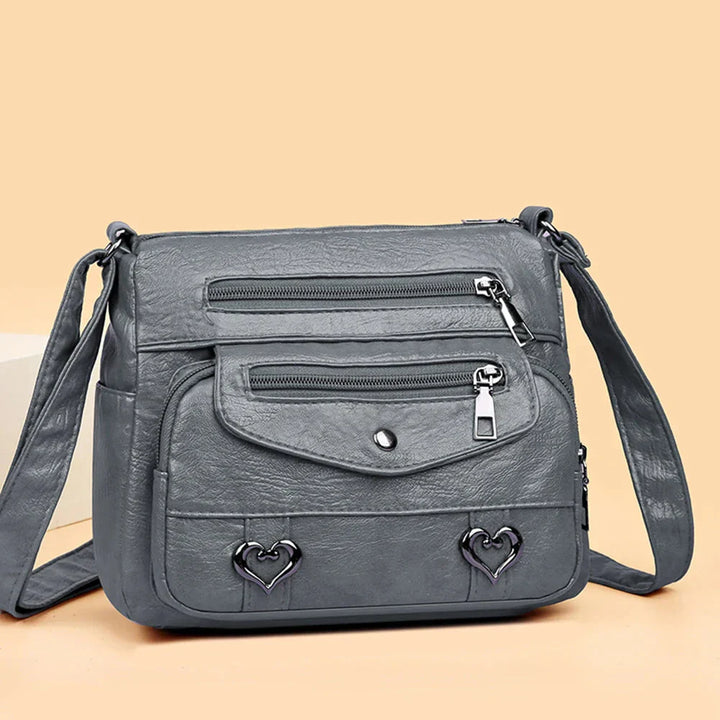 Sac bandoulière femme avec fermeture éclair, intérieur spacieux, design vintage 'Love' unique.