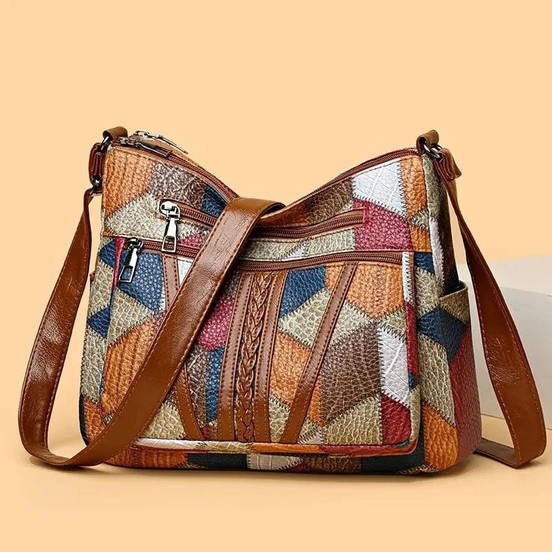 Sac bandoulière femme vintage en cuir patchwork coloré, un accessoire élégant et organisé pour le quotidien.