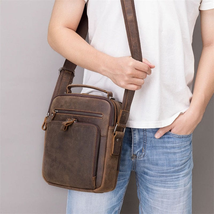 Sac bandoulière homme en cuir véritable noir, élégant et pratique pour le quotidien.