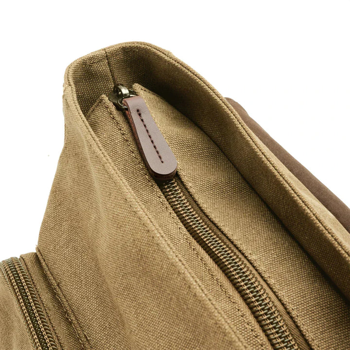 Sac bandoulière homme polyvalent en toile, robuste et pratique pour le travail, le voyage ou le style décontracté.