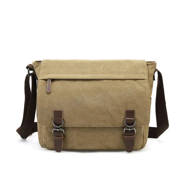 Sac messager homme robuste en toile, vue latérale soulignant sa capacité et son style décontracté.