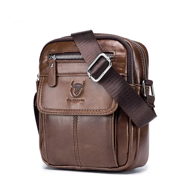 Sac bandoulière homme noir en cuir synthétique, élégant et pratique pour le quotidien et l'organisation.