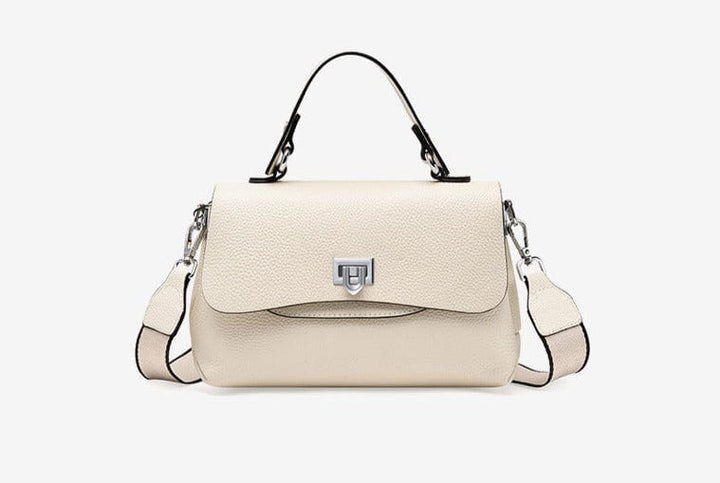 Sac bandoulière élégant en cuir pour femme, avec plusieurs compartiments pour une organisation facile.