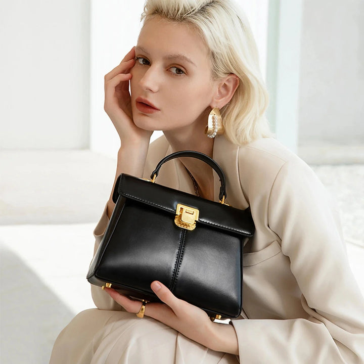 Sac à main en cuir véritable noir pour femme, style chic et pratique, accessoire mode indispensable.