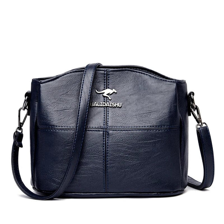Magnifique sac à main en cuir pour femme, style bandoulière, parfait pour accessoiriser vos tenues.