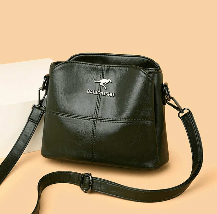Sac de ville femme en cuir, multi-couleurs, design épuré, très pratique et élégant.