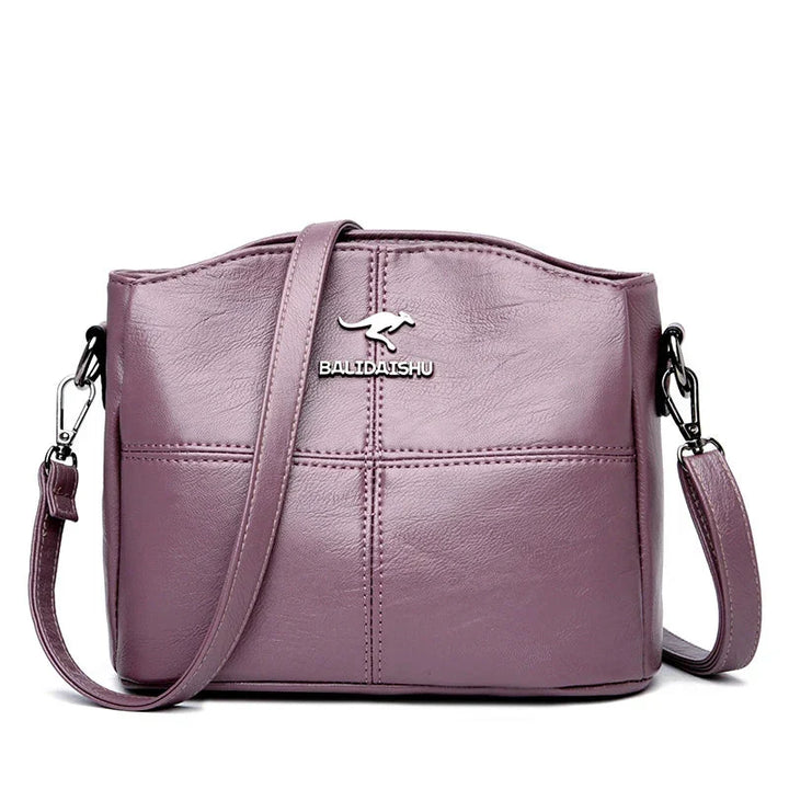 Accessoire femme : sac à main élégant en cuir, parfait pour un look sophistiqué au quotidien.