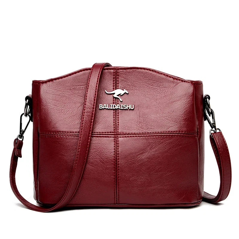 Sac à main femme tendance, en cuir, avec bandoulière ajustable. Élégance et fonctionnalité.