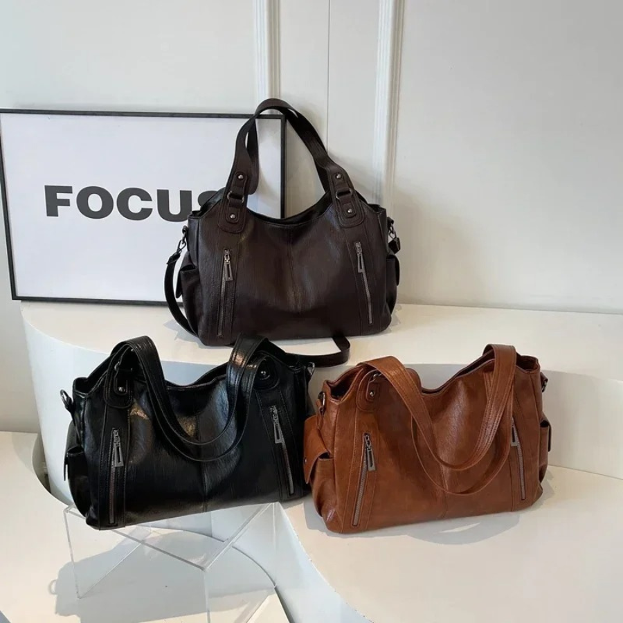 Sac élégant pour femme, style mode en cuir végétal, bandoulière ajustable, très utile.