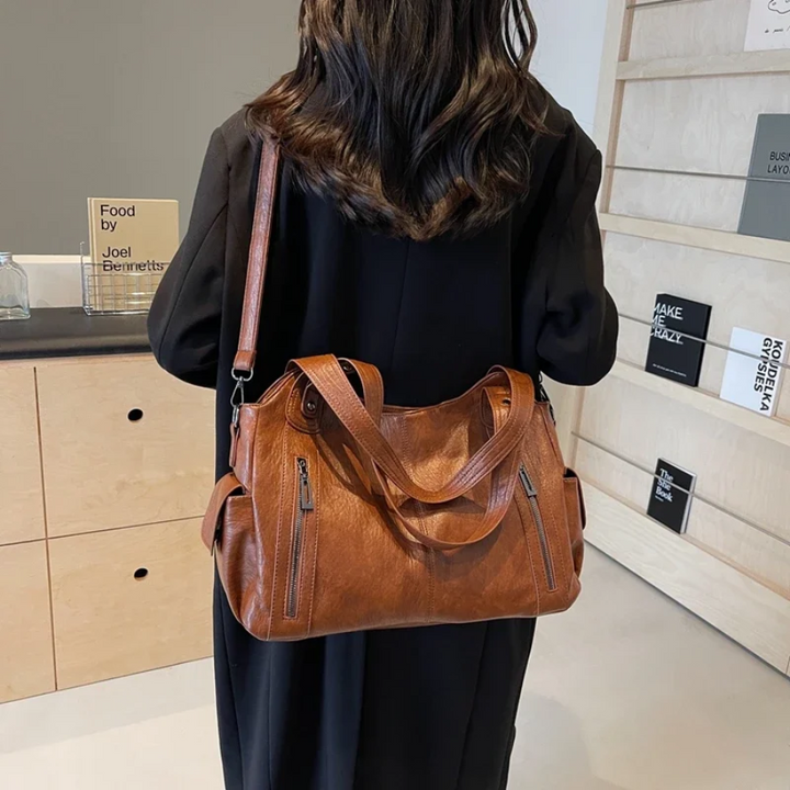 Chic sac femme en cuir végétal, bandoulière ajustable, idéal pour un usage quotidien.