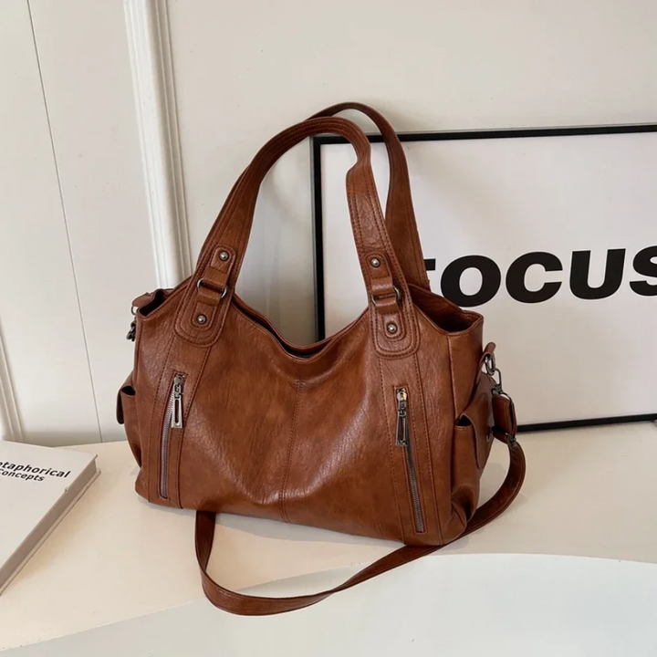 Sac élégant et pratique pour femme, design en cuir végétal, parfait pour la mode actuelle.