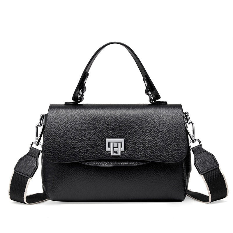Sac bandoulière élégant en cuir véritable noir pour femme, style moderne et chic, parfait pour toute occasion.