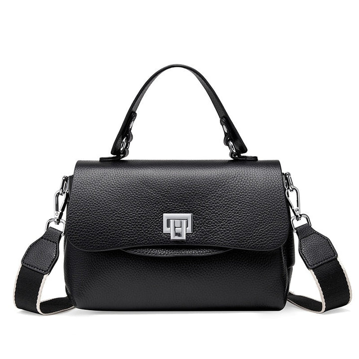 Sac bandoulière élégant en cuir véritable noir pour femme, style moderne et chic, parfait pour toute occasion.