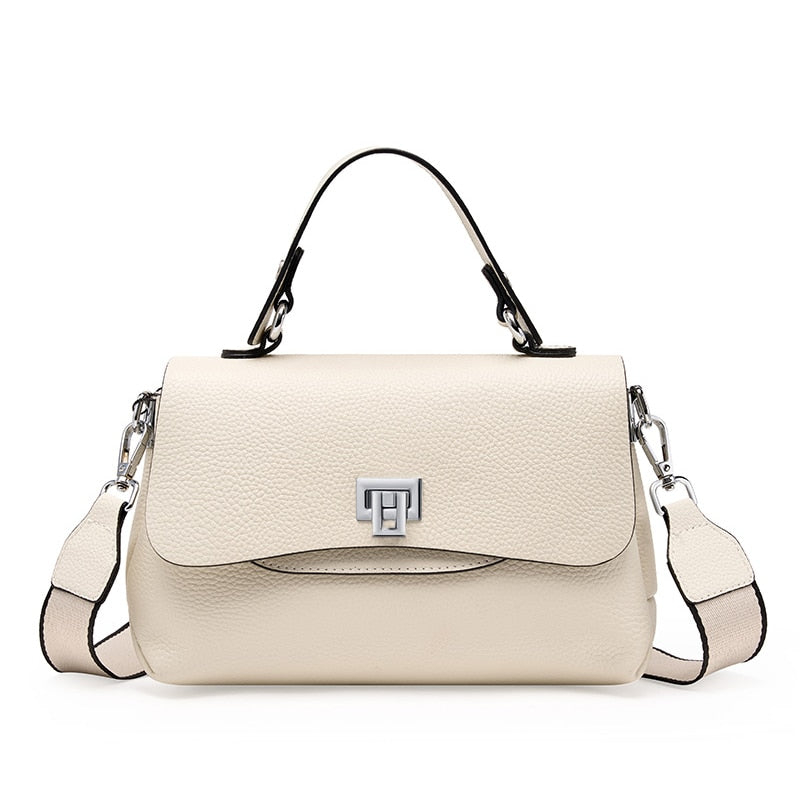 Sac bandoulière féminin en cuir véritable blanc, design sophistiqué et intemporel, idéal pour un look élégant.