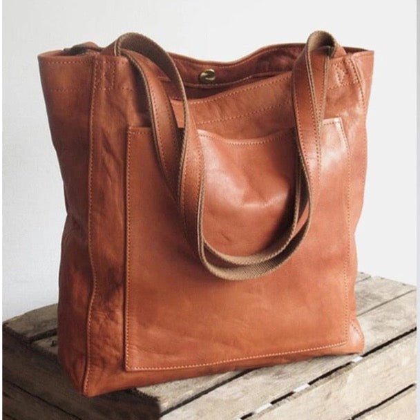 Sac bandoulière élégant en cuir véritable pour femme, parfait pour le quotidien et rehausser tout accessoire mode.