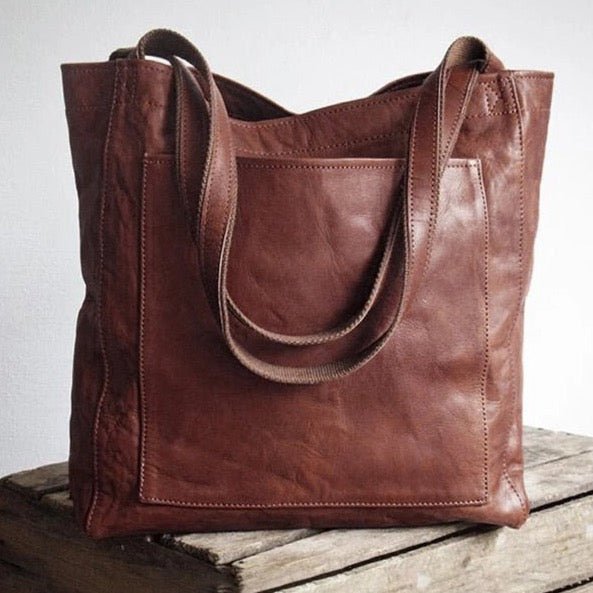 Sac à main femme en cuir véritable (brun, noir, café) offrant organisation et praticité pour vos essentiels quotidiens.