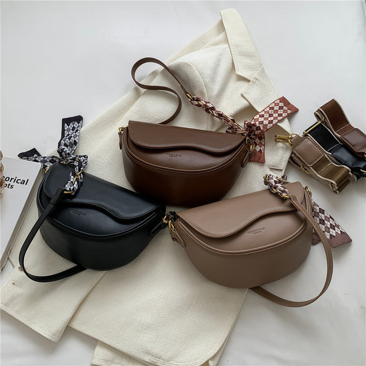 Sac bandoulière femme en cuir PU, un accessoire de mode intemporel pour un look quotidien raffiné.