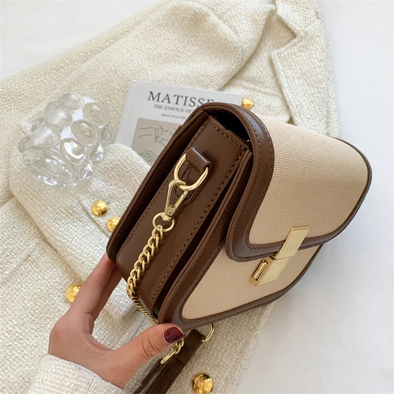 Intérieur sac bandoulière stylé femme en toile, doublure textile, avec pochettes organisées, sac chic