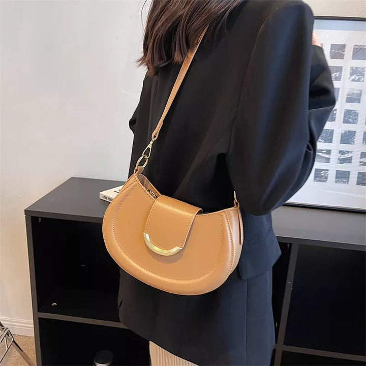 Accessoire femme: sac bandoulière beige Laia en similicuir, style élégant et pratique pour la mode au quotidien.