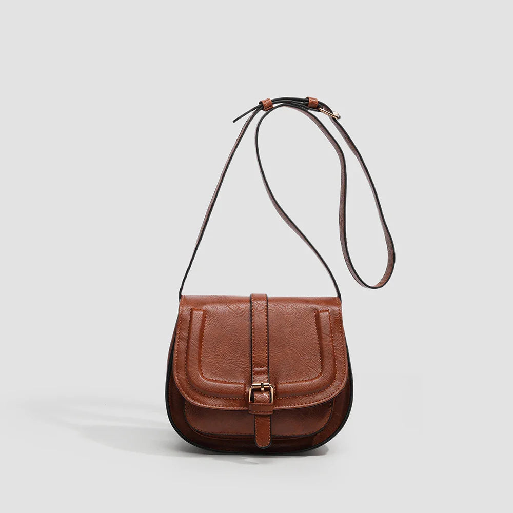 Accessoire de mode féminine: sac bandoulière marron, similicuir de qualité, style chic
