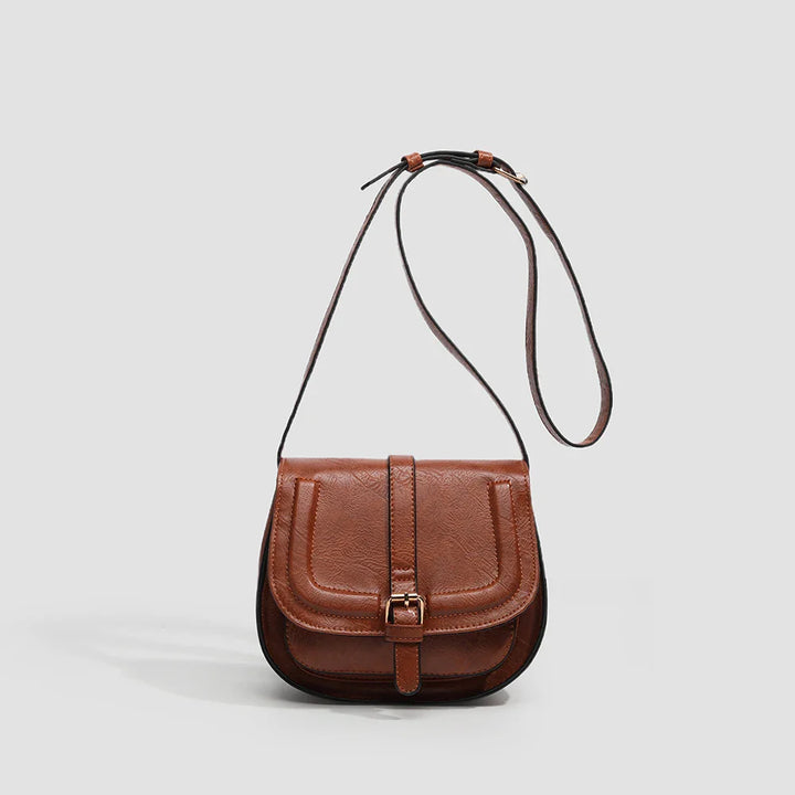 Accessoire de mode féminine: sac bandoulière marron, similicuir de qualité, style chic