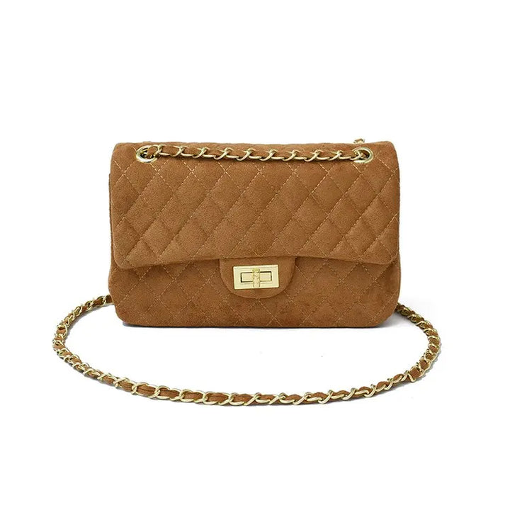 Sac bandoulière matelassé femme, texture douce, avec élégante chaîne. Sac épaule chic et intemporel.
