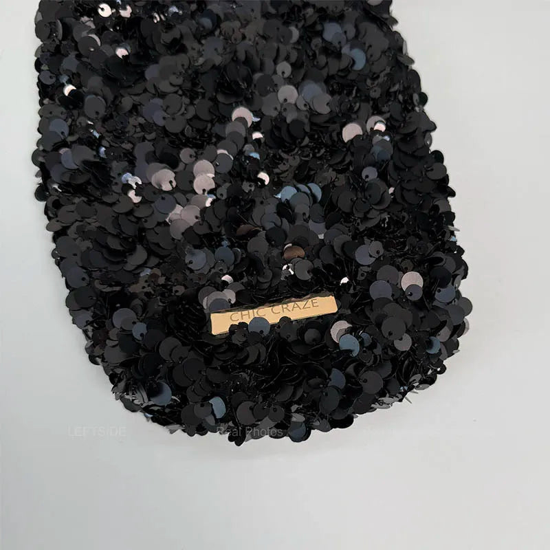 Sac bandoulière noir paillettes, chic et élégant pour femme, parfait pour la mode soirée.