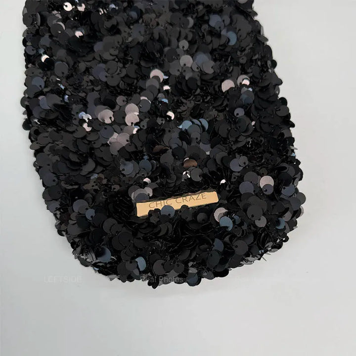 Sac bandoulière noir paillettes, chic et élégant pour femme, parfait pour la mode soirée.