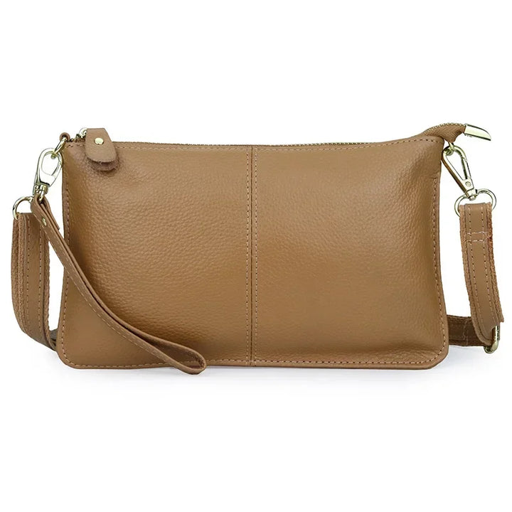 Sac bandoulière femme, design rectangulaire épuré, en simili cuir, accessoire quotidien chic.