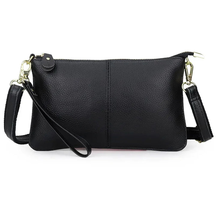 Petit sac bandoulière rectangle femme, en cuir synthétique, idéal pour un look quotidien raffiné.