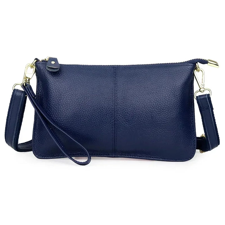 Sac à bandoulière rectangulaire en cuir synthétique, accessoire féminin indispensable.