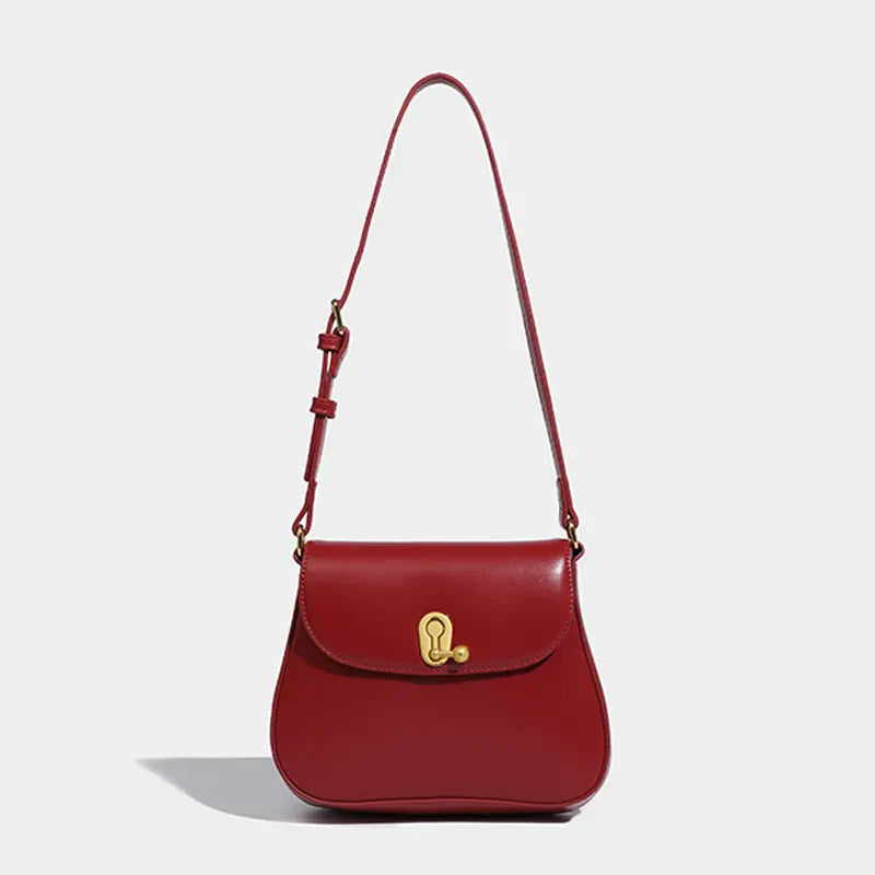 Sac élégant: sac bandoulière rouge en cuir synthétique avec détails dorés, pour femme